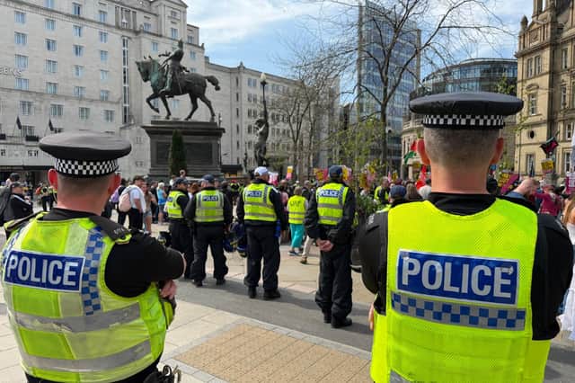 Police in Leeds City Square this afternoon. 