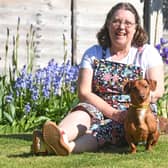 Lindy Fox has fostered 100 dogs with the Dogs Trust, with Nacho becoming her century foster - and now, a trip to Buckingham Palace.