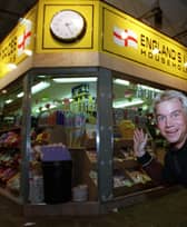 Neil Goodwin on his stall, 'England's Lowest Prices',   at Leeds Market, in 1998