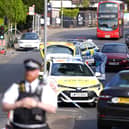 A forensics officer at the scene in Golders Green,