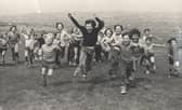 Children having fun at the park in Parson Cross, Sheffield, in August 1975