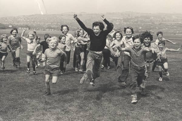 Children having fun at the park in Parson Cross, Sheffield, in August 1975