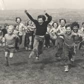 Children having fun at the park in Parson Cross, Sheffield, in August 1975