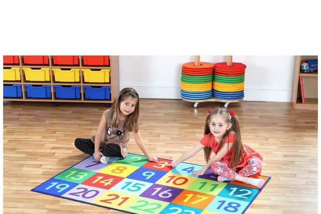The numbers on this carpet are printed to current curriculum standards