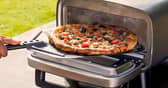 The Ninja outdoor pizza oven cooks 12-inch pizzas in minutes with high heat and even results