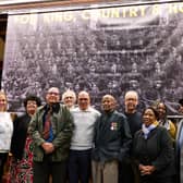 The city's last surviving Caribbean World War Two RAF veteran, Alford Gardner (1926-2024), front centre wearing his medals, with veterans' relatives at the 2023 For King, Country & Home exhibition.