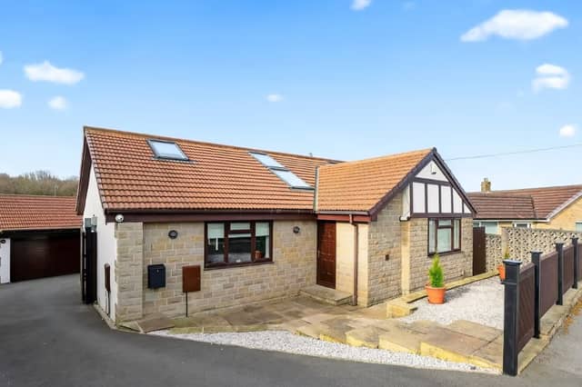 A four-bedroom detached bungalow that is for sale on Templegate Road, Leeds.