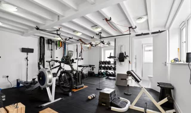 The gym in a four-bedroom detached bungalow that is for sale on Templegate Road, Leeds.