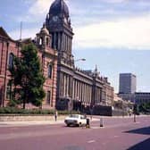 On the left of this view is the Oxford Place Methodist Chapel, built of red brick with contrasting stone ornamentation. Westgate is visible in the foreground, becoming The Headrow after the junction with Oxford Place.