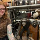 Sarah Burhouse, Leeds Museums and Galleries’ curator of natural sciences, with her Sir David Attenborough tattoo near one of the exhibitions celebrating the legend's 100th birthday.