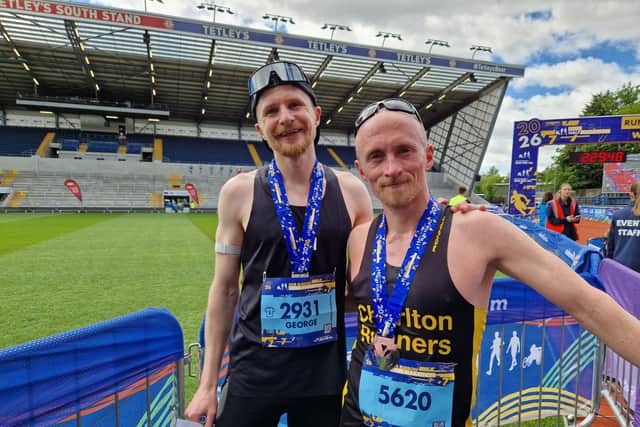 Marathon winner George Ravenhall, left, with runner up Tom Charles