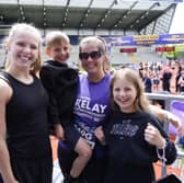 Lindsey Burrow and her children - Macy, Jackson and Maya - at the finish line