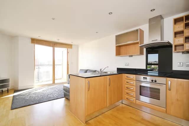 The open-plan kitchen and dining layout creates a bright and sociable heart of the home