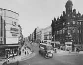Leeds, Briggate, in the 1960s, with shops including Saxone shoes