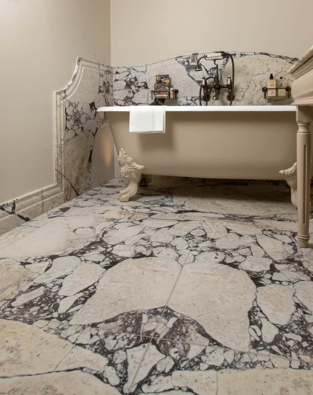 STATEMENT MARBLE: Breccia Viola is one of the many captivating stones at Lapicida Slab Gallery.