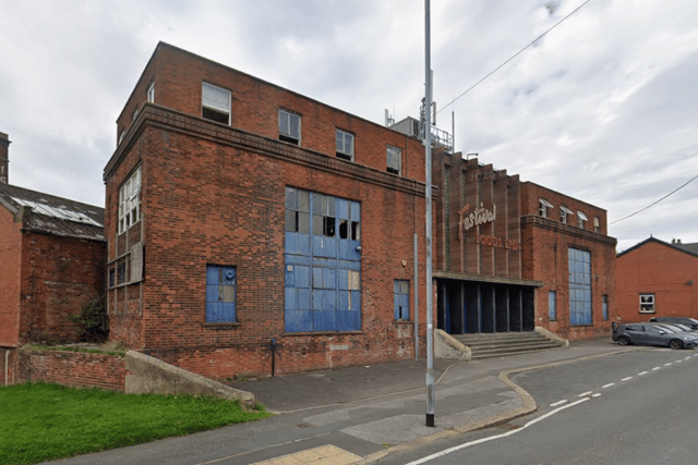 Six fire engines and one aerial unit are currently fighting a fire at the former Festival Foods building.