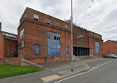 Six fire engines and one aerial unit are currently fighting a fire at the former Festival Foods building.