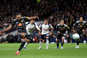 Dominic Calvert-Lewin's well-struck penalty earned Leeds United a point at Tottenham.