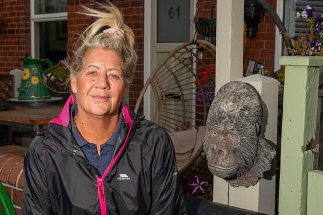 Adele Teale, 59, has been ordered to remove the 4kg resin figure from outside her two bedroom terraced home within four weeks or face possible legal action and a fine.