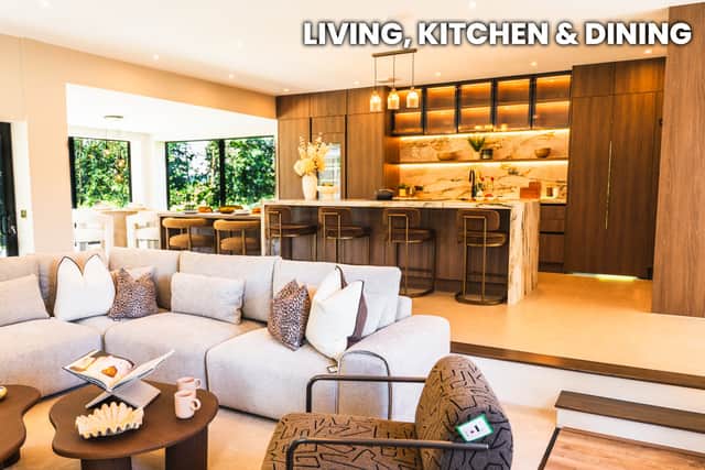 The rooms are all huge, with a sunken living space below the lavish kitchen