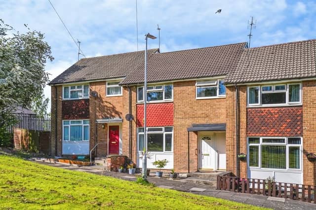 The townhouse enjoys an open outlook across green space in a popular residential part of Leeds
