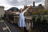 15th May 2026
Pictured Opera North's soprano Katie Bird sings 'The Hills Are Alive' from the balcony of The Queens Hotel, Leeds
Picture Gerard Binks
