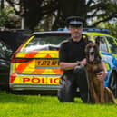 PC Lee Geary from West Yorkshire Dog Section with police dog Mason.