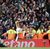 MAYHEM: As Leeds United's fans and Dominic Calvert-Lewin celebrate their late winner against Brighton at Elland Road.