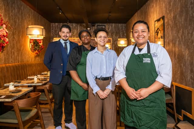 Pictured (left to right) Davi Conceicao, Anna Soumahoro, Soukaina Ziraoui, and Fern Lattawan Buchanan inside the new restaurant.