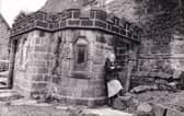 Owner Doris Stead pictured outside the outside toilets at Alma Cottages in March 1993.