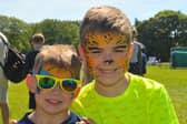 Brothers Thomas, five and William Pearse of Leeds enjoy the sunshine.