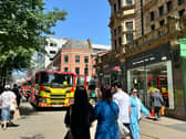 Fire services cordened off the busy area of Leeds city centre around lunchtime today