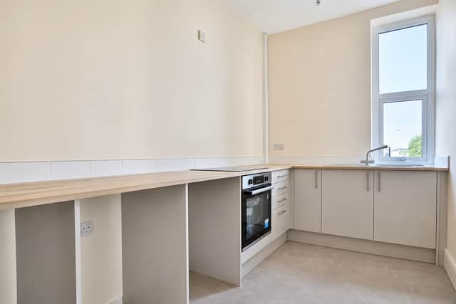 The fitted kitchen provides a practical hub for busy family life with plenty of room for everyday living
