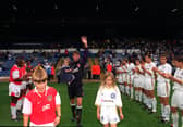 John Lukic walks out with daughters Zoe, 2, Amy, 9, and son John, 10. 