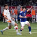 BIG ROLE: Played by Leeds United midfielder Ao Tanaka, right, for Japan in a 1-0 win against Iceland.