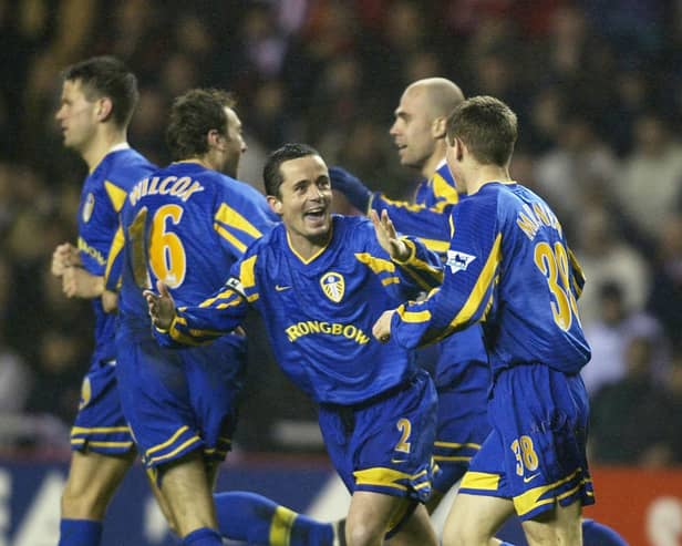 James Milner celebrating with experienced defender Gary Kelly after becoming the Premier League's youngest ever goalscorer.