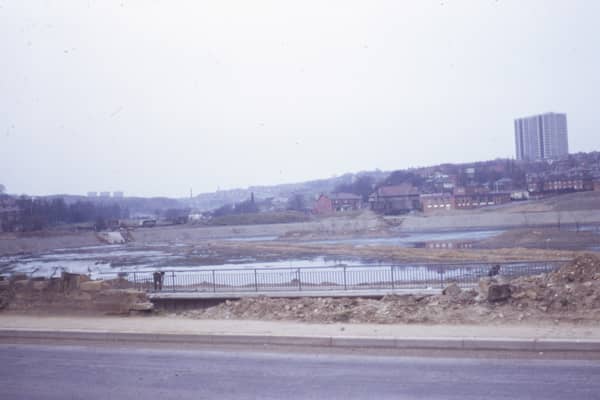 Looking from Tong Road onto a site being developed into a reservoir, bordered by Ring Road, Farnley on the left, Butt Lane at the far end, and Pudsey Road on the right. Pictured in March 1973.