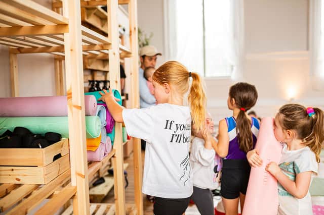 Zoe describes the yoga studio as a "family project" which is supported by three generations