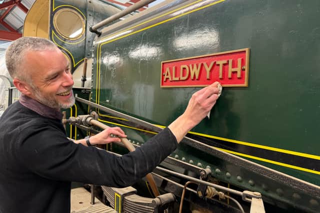 Chris Sharp, keeper at Leeds Industrial Museum, polishes Aldwyth.