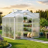 The walk-in greenhouse provides a dedicated space for growing plants while helping protect them from changing weather conditions