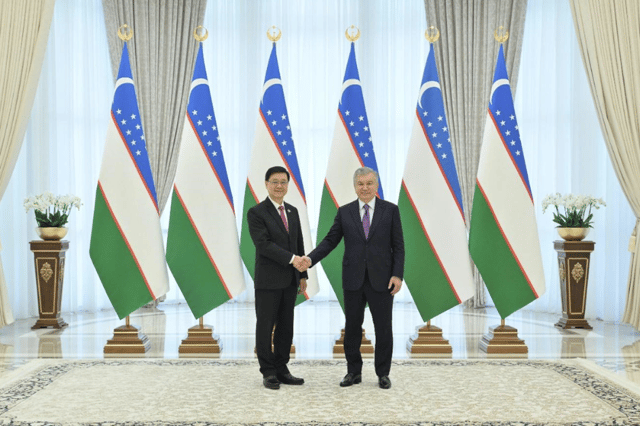 Hong Kong SAR's chief executive John Lee meets with the President of Uzbekistan, Shavkat Miromonovich Mirziyoyev