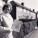 Jean Shields with the report complied by Broom Tenants' and Houseowners' Association in October 1986.