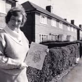 Jean Shields with the report complied by Broom Tenants' and Houseowners' Association in October 1986.