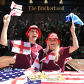 Bar Manager Joe Blakeley and bar staff Leah Schofield get ready for the World Cup at The Brotherhood, Leeds.