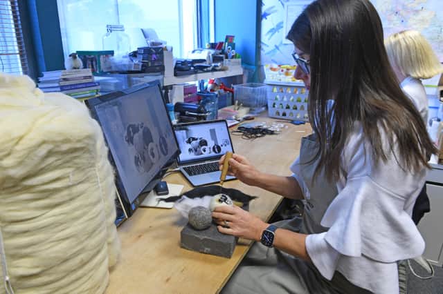Sarah pictures making sheep-themed wool dryer balls