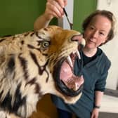 Curator Clare Brown with the Leeds Tiger.
