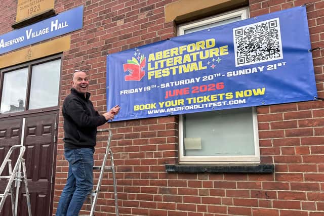 Aberford Literature Festival organiser Chris Berry smiles and points to a large promotional banner affixed to the brick wall of Aberford Village Hall - the site of a literary revolution in the making.