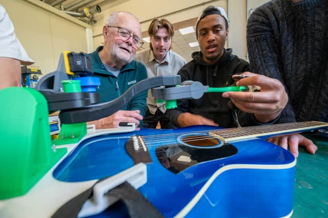 (L-R) Gerry Van Hee, chair of REMAP Leeds, with University of Leeds students Harvey Roberts and Phil Asante-Siaw