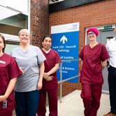 Craige Richardson, deputy chief executive at Leeds Teaching Hospitals NHS Trust, with
staff at Seacroft Community Diagnostic Centre.