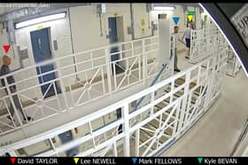 Kyle Bevan, 33, makes his way to his cell and is followed by Lee Newell, 57, Mark Fellows, 47, and David Taylor, 64.